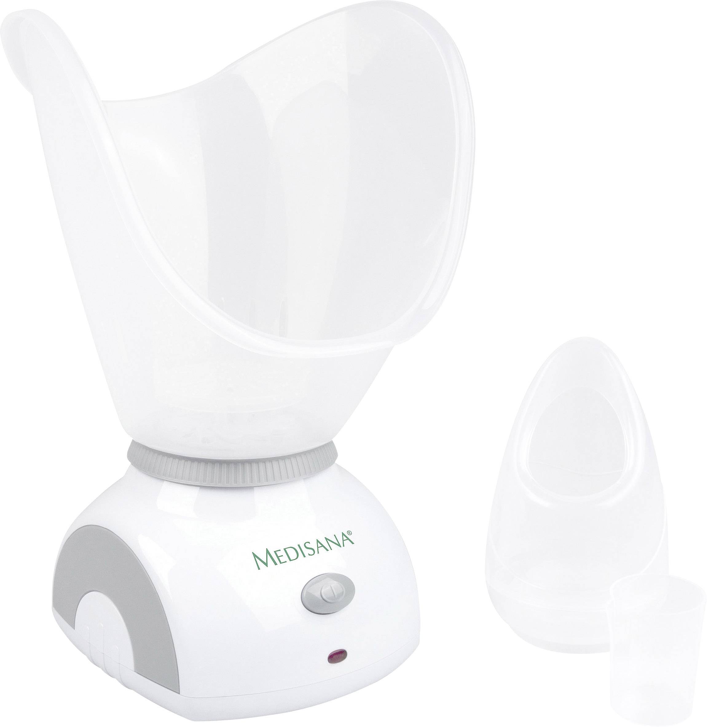Un inhalateur facial blanc avec embout amovible et un petit gobelet doseur à côté, destiné à la thérapie par inhalation.