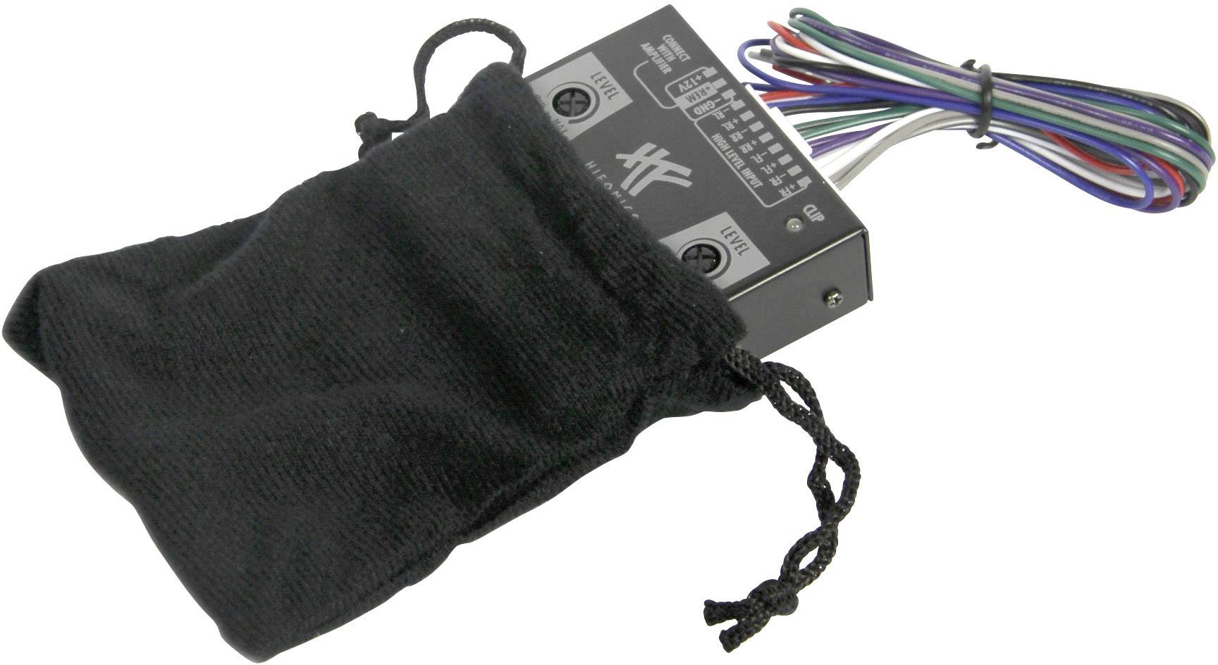 Un appareil électronique avec plusieurs câbles dans un sac en tissu noir.