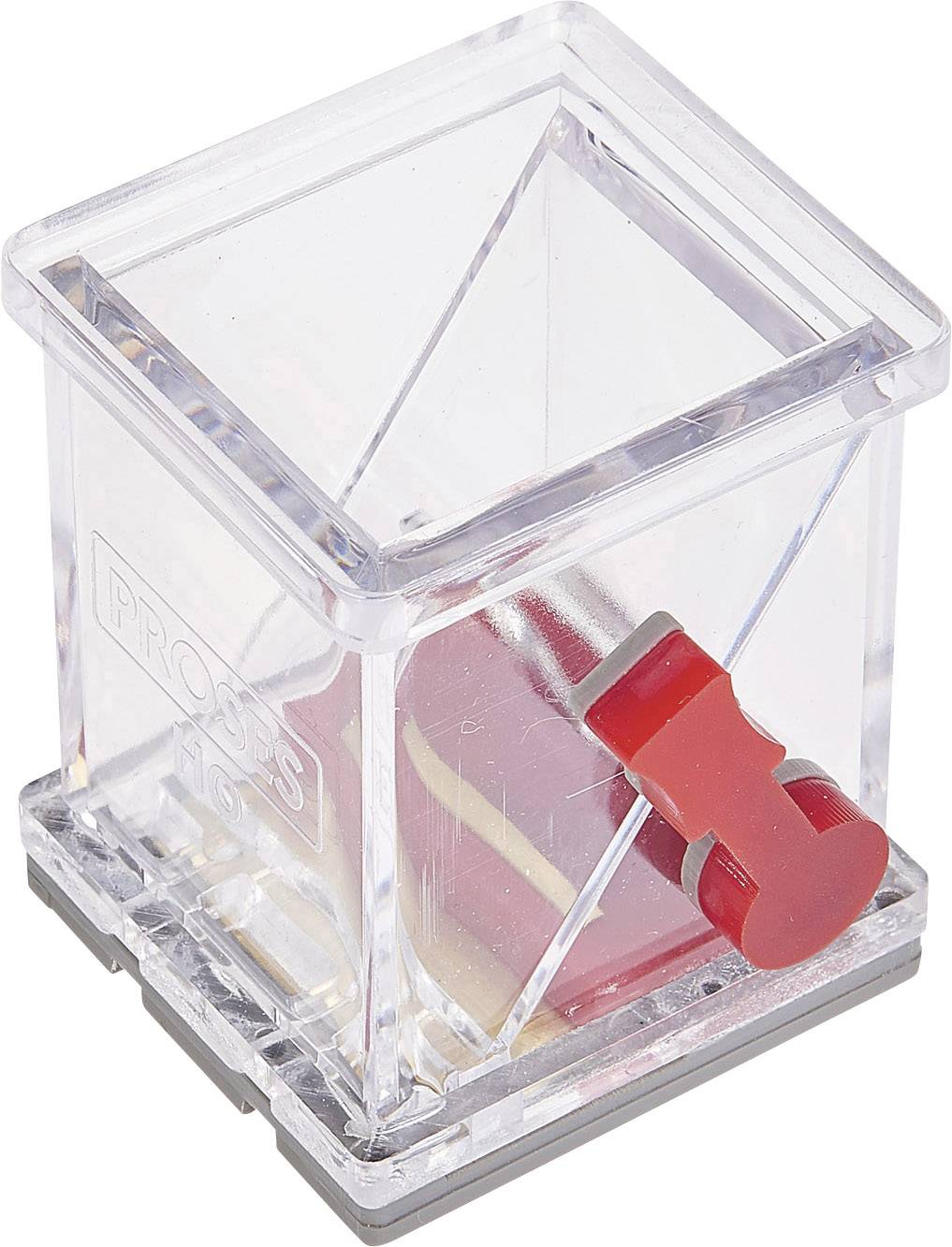 Petit récipient en plastique transparent avec un levier rouge sur le côté, utilisé pour ranger de petits objets ou comme tirelire.