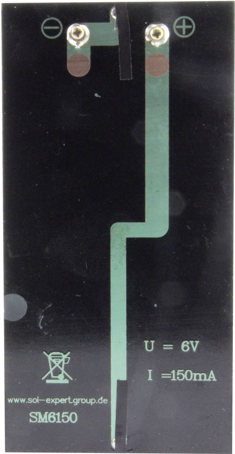 Carte de circuit imprimé noire avec circuit électrique vert. Étiquetée 'U = 6V' et 'I = 150mA'. Pôles positif et négatif marqués.