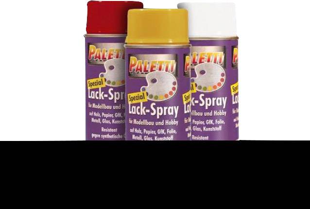 Trois bombes de peinture en aérosol de la marque 'Palette'. Étiquettes en violet avec le logo de la palette de couleurs et l'inscription 'Laque Spéciale en Spray'. Couleurs : Rouge, Jaune, Blanc.