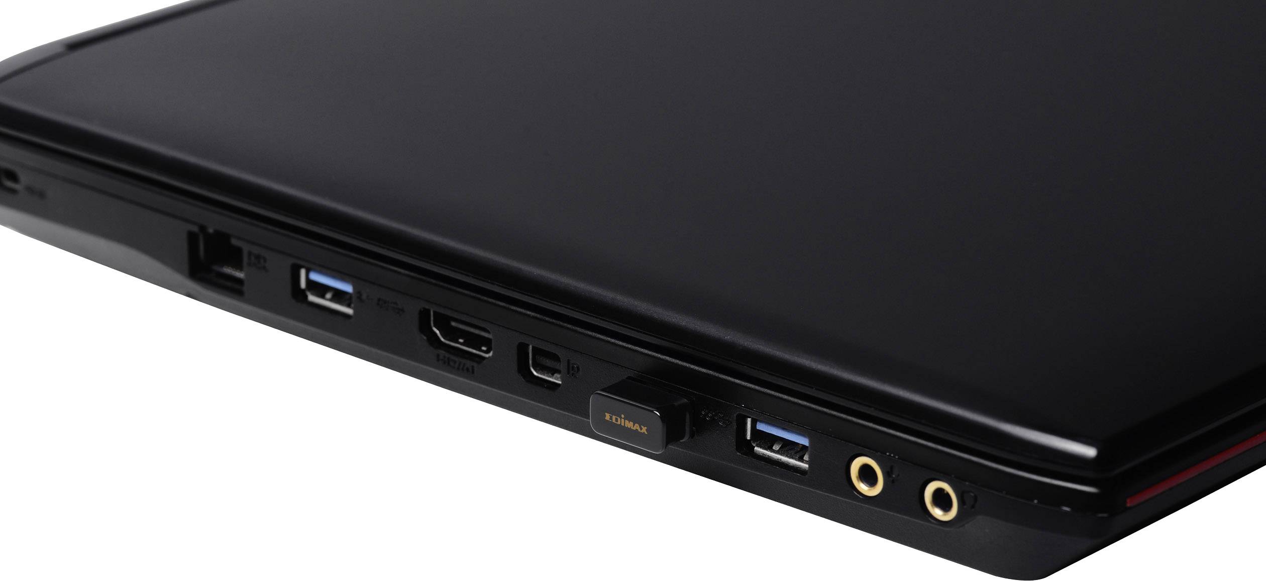 Ordinateur portable noir avec plusieurs ports sur le côté, notamment des ports USB, HDMI et audio.