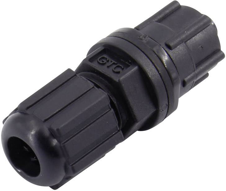Une fiche noire, cylindrique à surface striée, adaptée aux connexions électriques en extérieur.