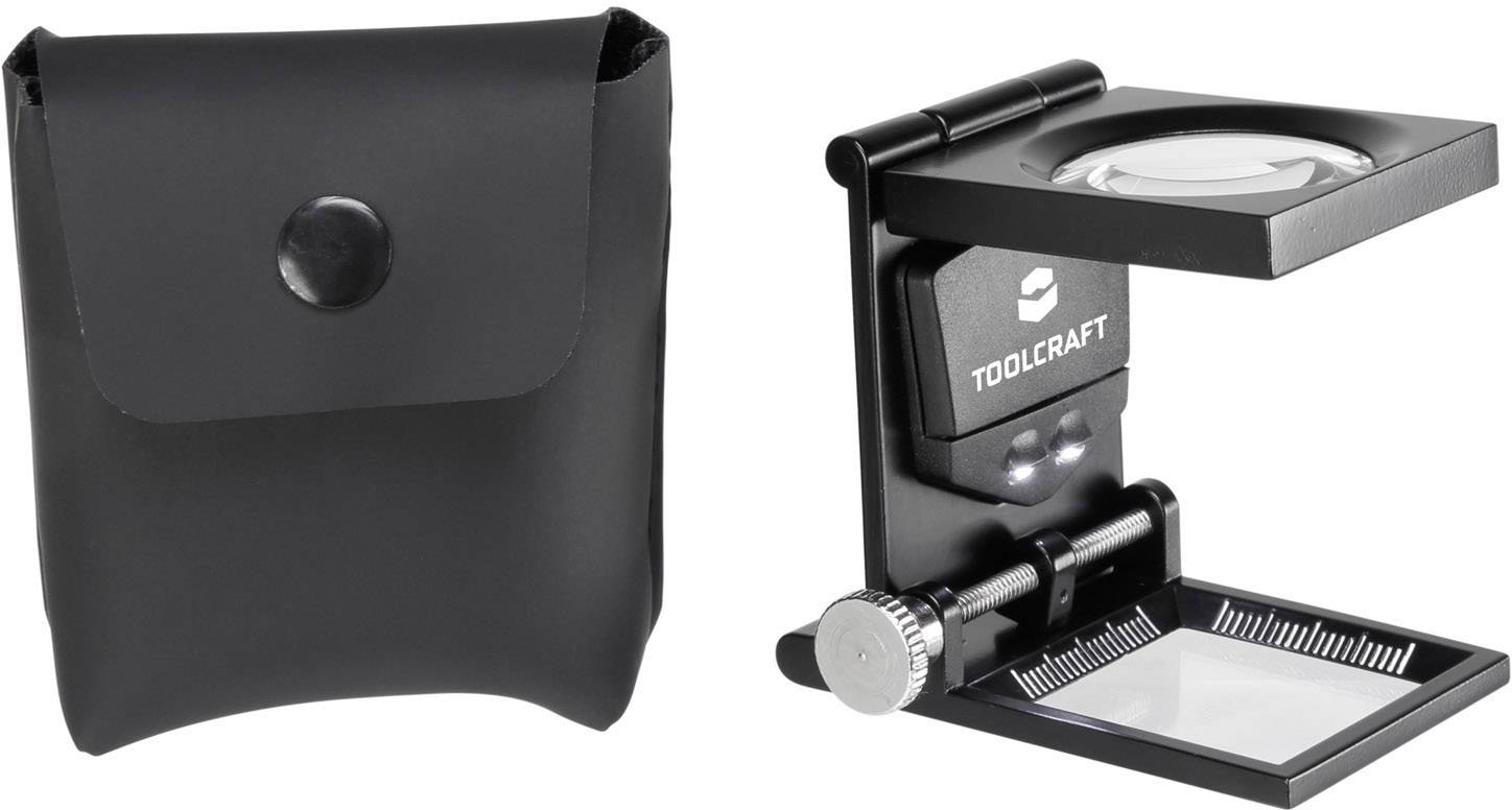 Loupe portable avec lumière LED et molette de mise au point, à côté d'un étui de protection noir. Idéale pour des vues détaillées lors de vos déplacements.