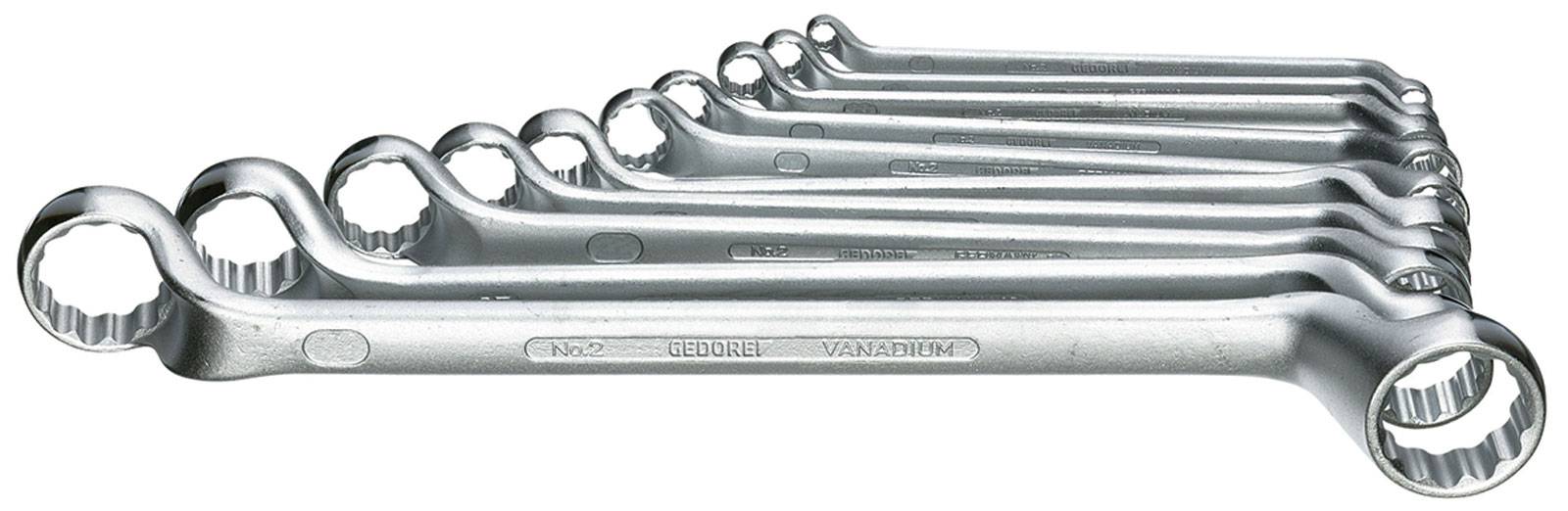 Sept clés à anneau métalliques de tailles croissantes, disposées par ordre, en métal. Chaque outil porte l'inscription 