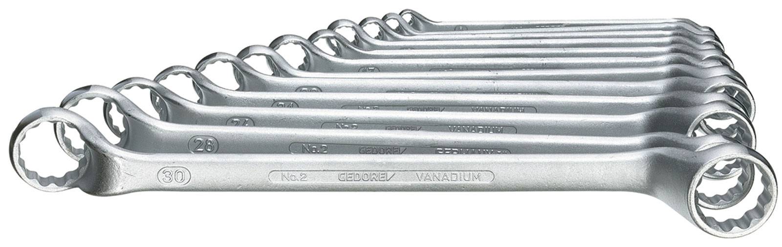 Une série de clés à fourche en métal de différentes tailles, disposées du plus grand au plus petit.