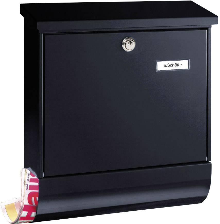 Boîte aux lettres noire avec plaque nominative 'B. Schäfer' et journal dépassant du compartiment inférieur.