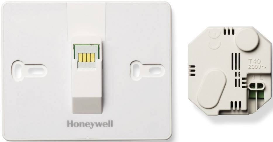 Un module de connexion électrique avec connecteur et boîtier, nom de marque 'Honeywell' visible, adapté aux systèmes T40 230V.