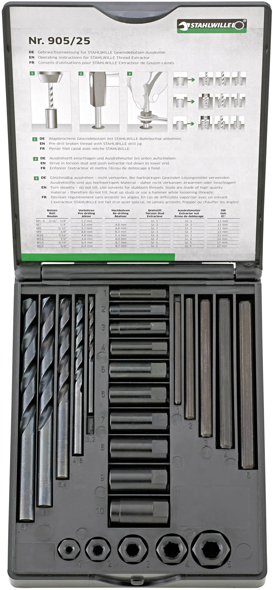 Une boîte à outils ouverte contenant divers forets et rallonges disposés en grille ordonnée. Un manuel se trouve en haut de la boîte.