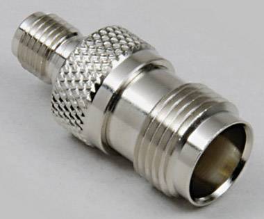 Un adaptateur métallique argenté à surface texturée, présentant deux extrémités de connexion différentes pour des raccordements techniques.