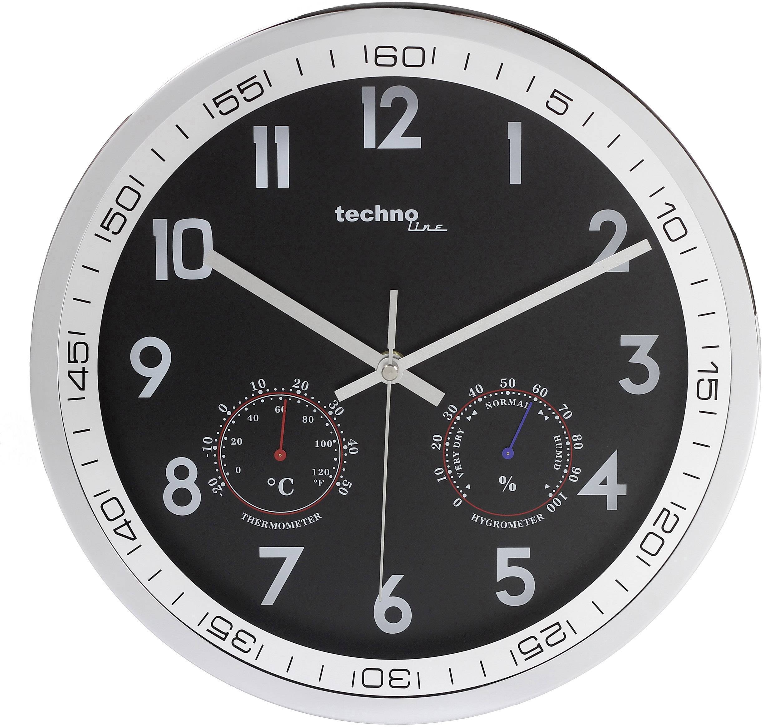 Horloge murale ronde au cadran noir, avec des chiffres blancs et trois aiguilles. Un thermomètre et un hygromètre sont intégrés.
