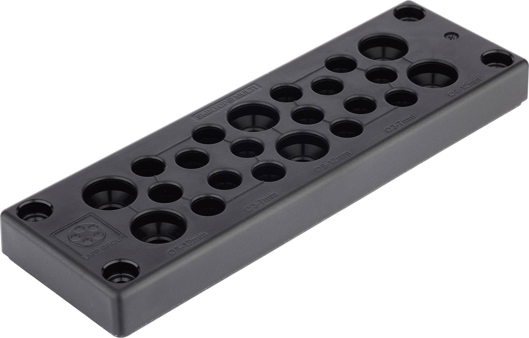 Un morceau rectangulaire de plastique noir avec de nombreuses ouvertures rondes de différentes tailles disposées de manière variée.