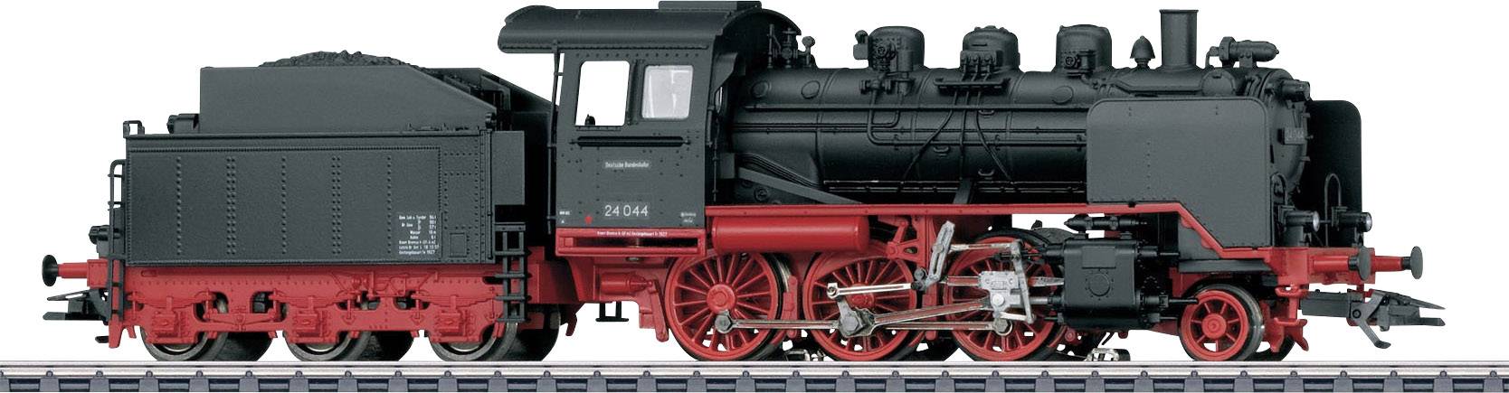 Locomotive à vapeur noire et rouge sur des rails, vue latérale. Locomotive avec des éléments détaillés et l'inscription 'T 004'.