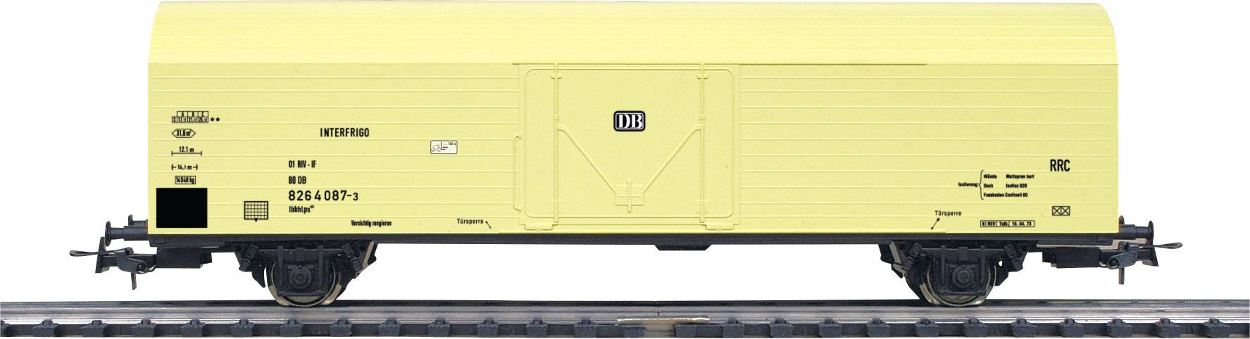 Wagon de marchandises jaune sur des rails, vu de côté. Marqué 'DB' au centre. Forme rectangulaire, deux roues de chaque côté.