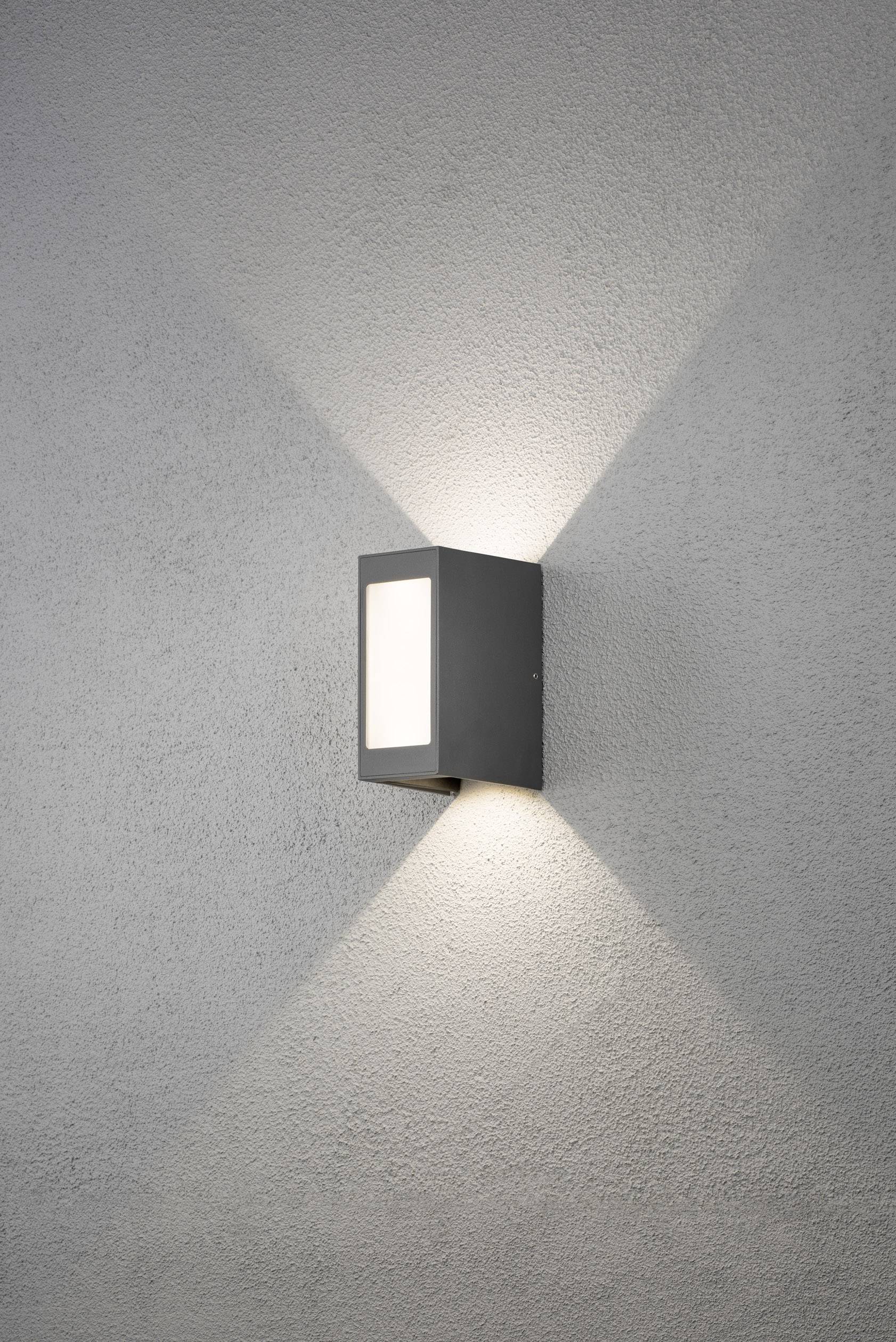 Applique murale moderne avec boîtier rectangulaire en gris. S'illumine vers le haut et le bas, créant un jeu subtil de lumière et d'ombres.