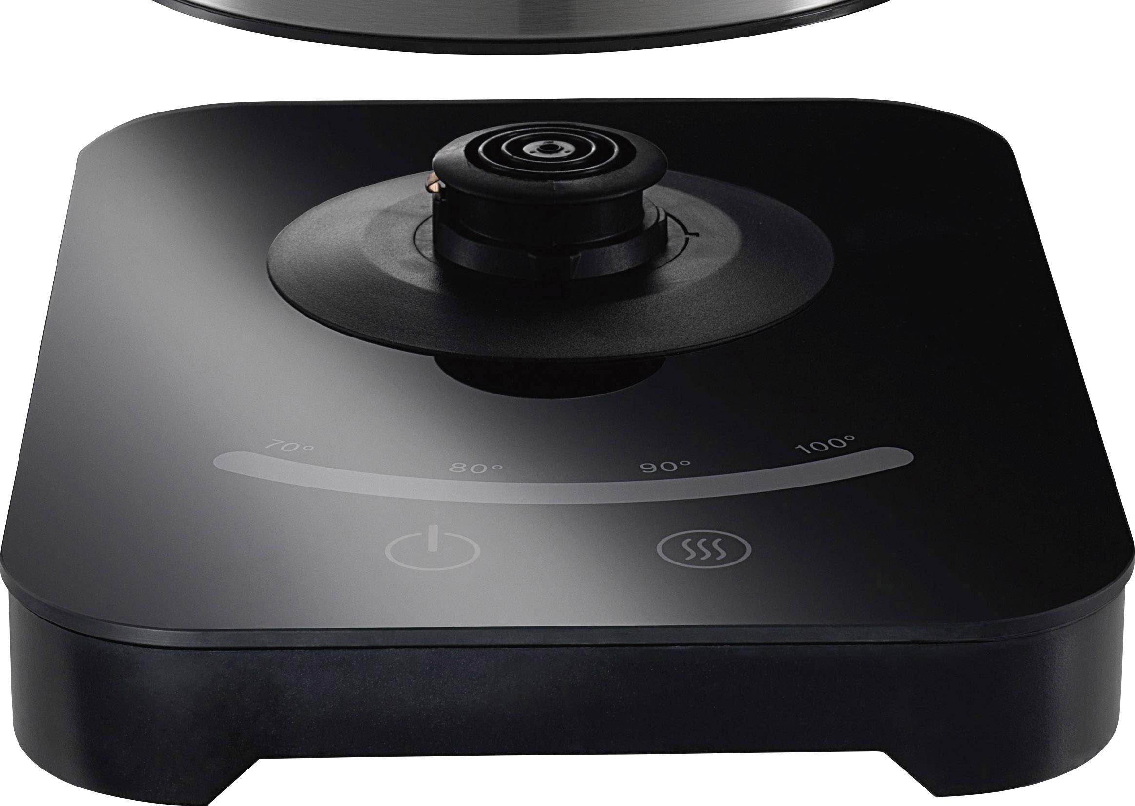 Une plaque de cuisson à induction noire, rectangulaire, avec affichage de la température, indiquant 70 à 100 degrés. Un support pour casserole est monté au centre.