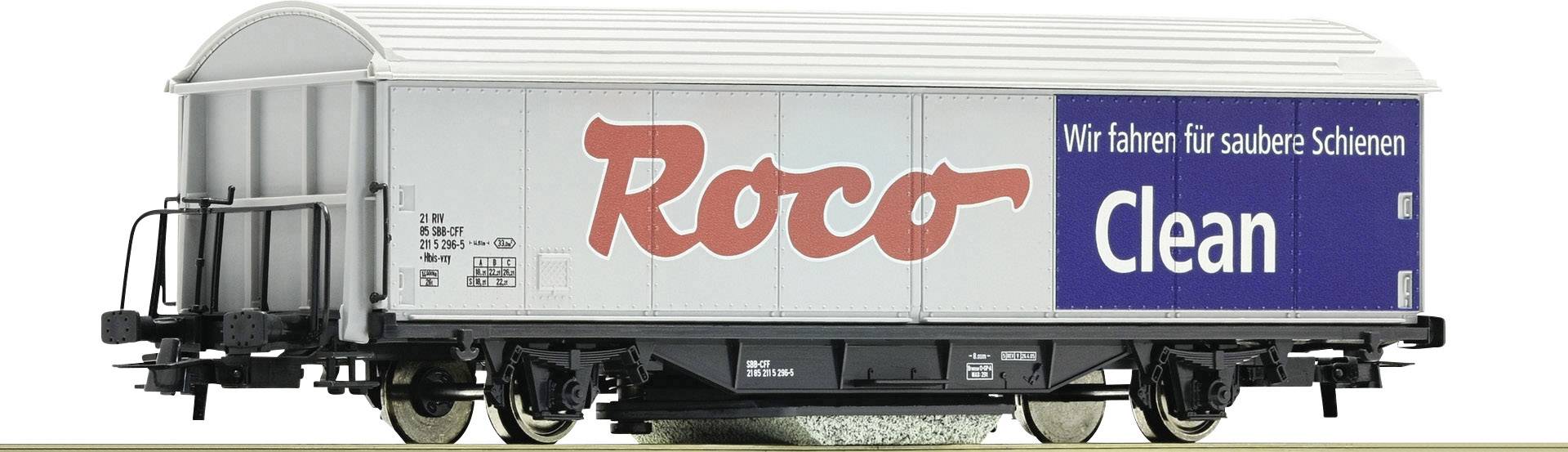 Wagon de marchandises de train miniature avec le logo 'Roco Clean' et le slogan 'Nous roulons pour des voies propres'. Design épuré en blanc et bleu.
