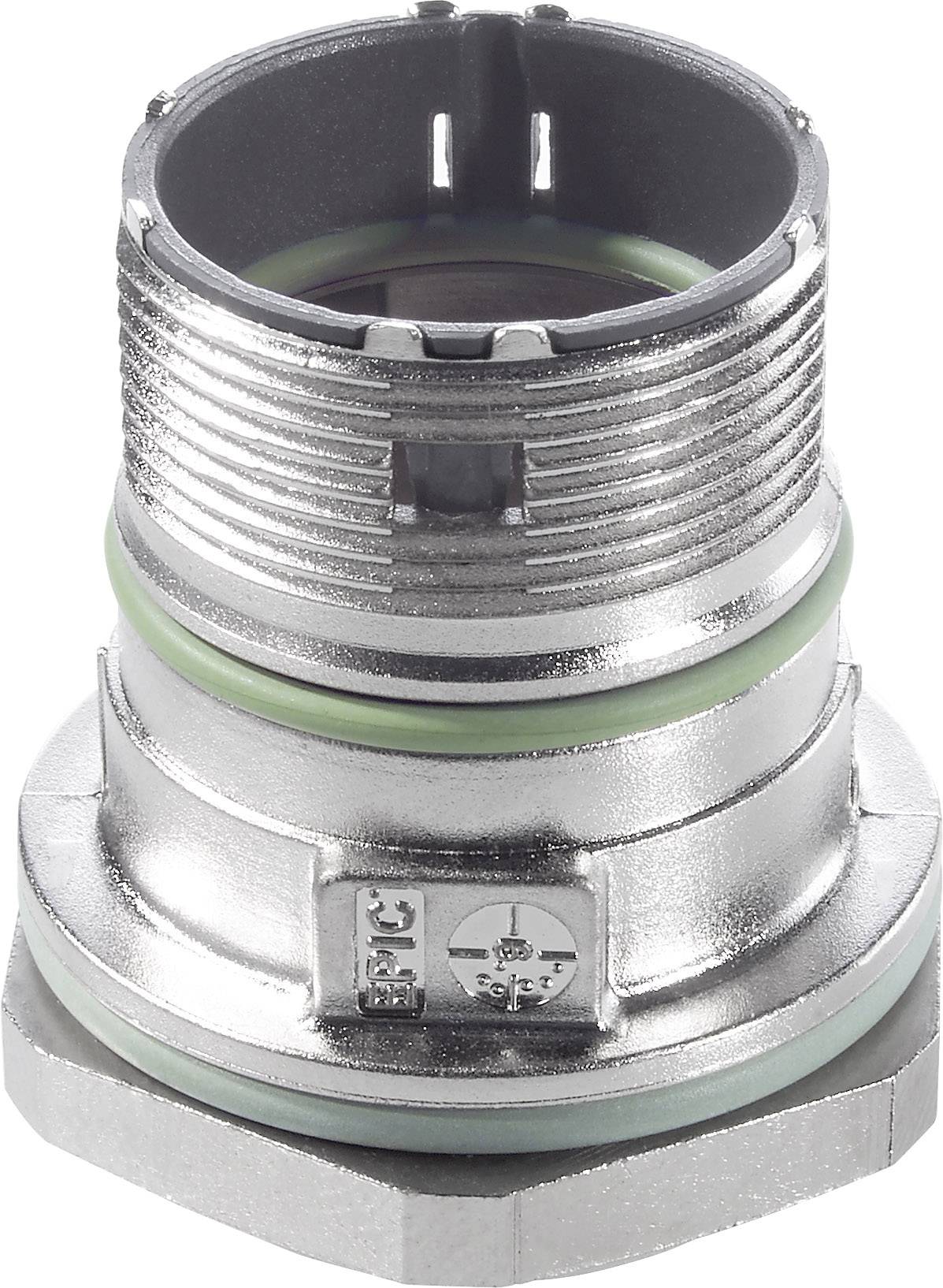 Une pièce métallique cylindrique en argent avec des rainures et un joint d'étanchéité vert. Ouverte en haut, avec une base hexagonale en bas.