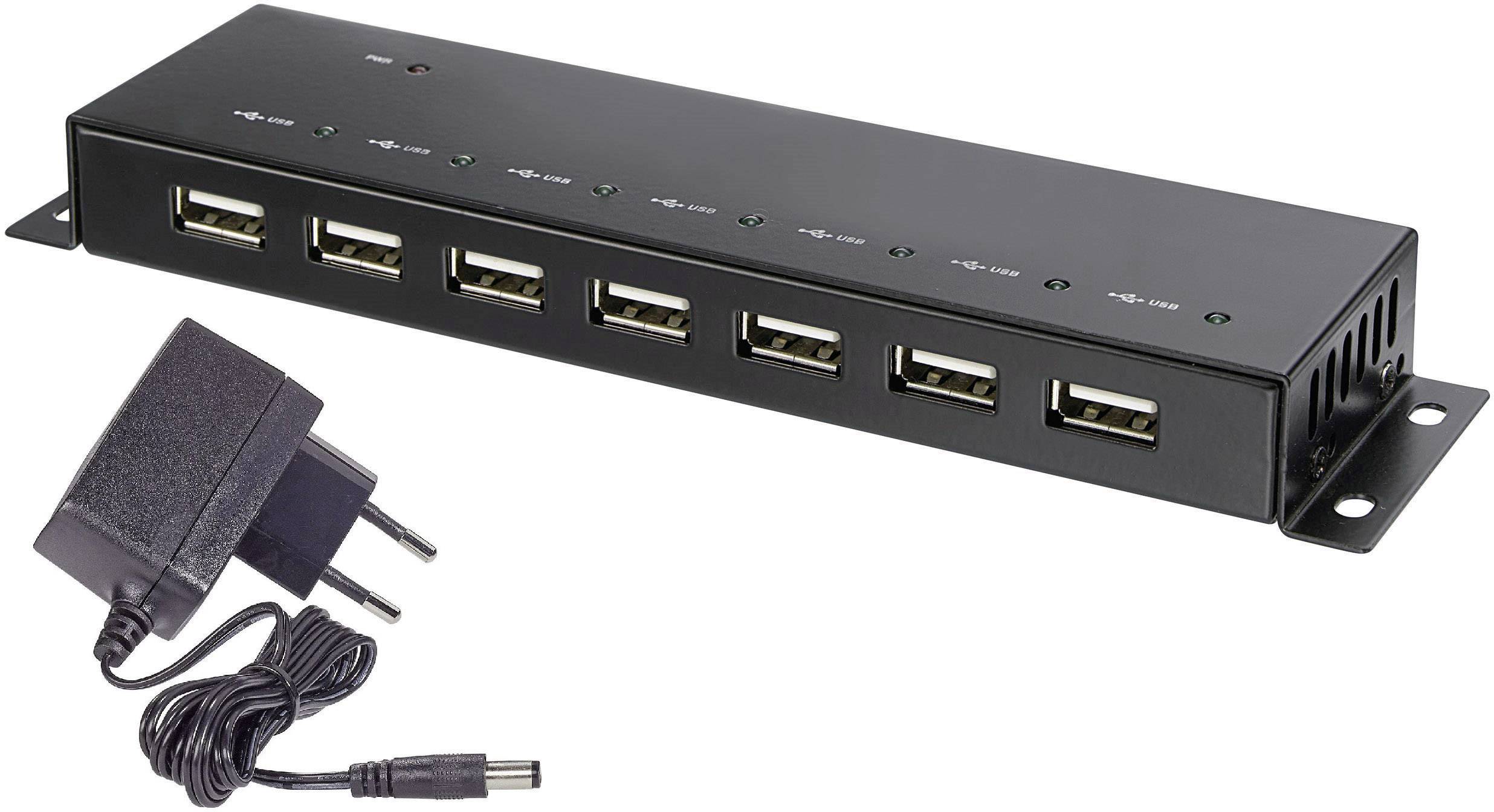 Hub USB à sept ports avec bloc d'alimentation pour l'alimentation électrique. Adapté pour étendre la connectivité USB des ordinateurs.