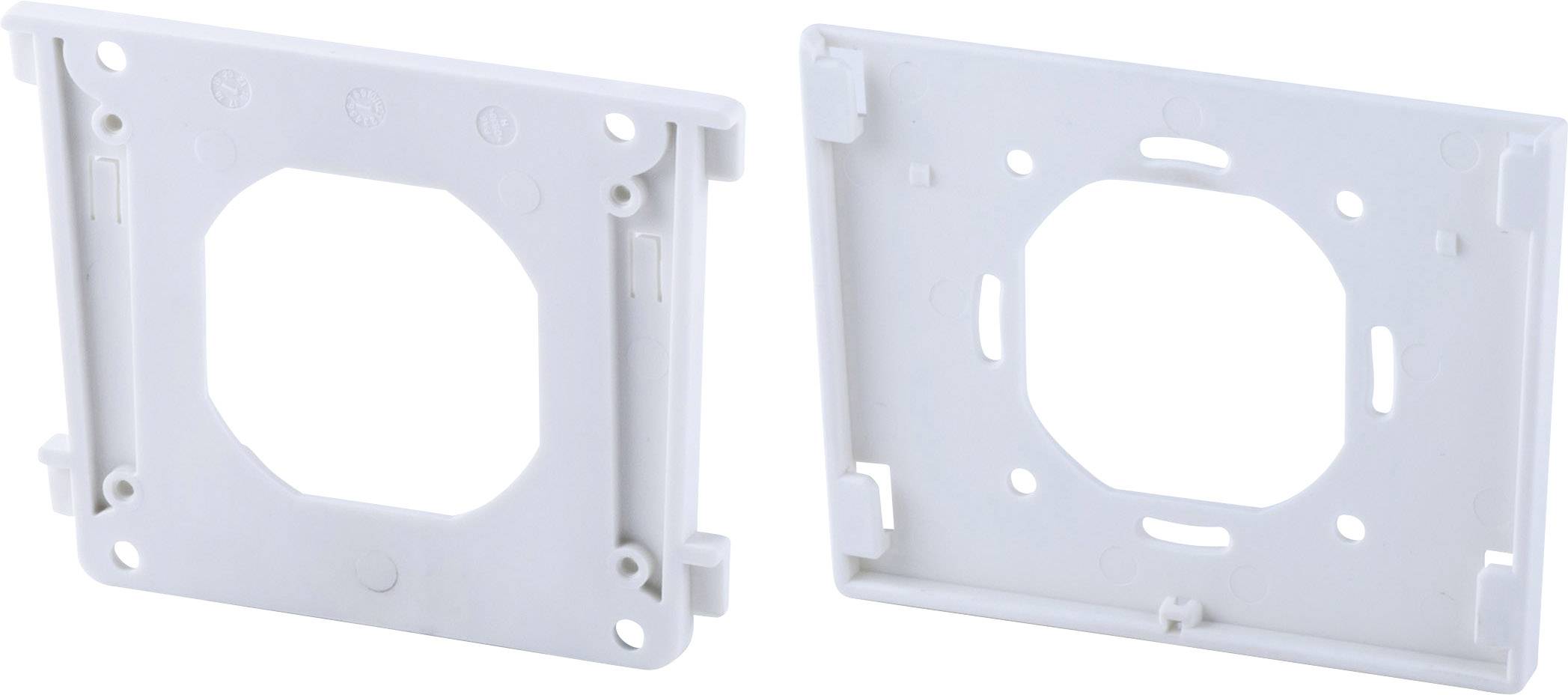 Deux plaques de montage blanches en plastique avec des découpes carrées, sont placées verticalement côte à côte, montrant des côtés différents.