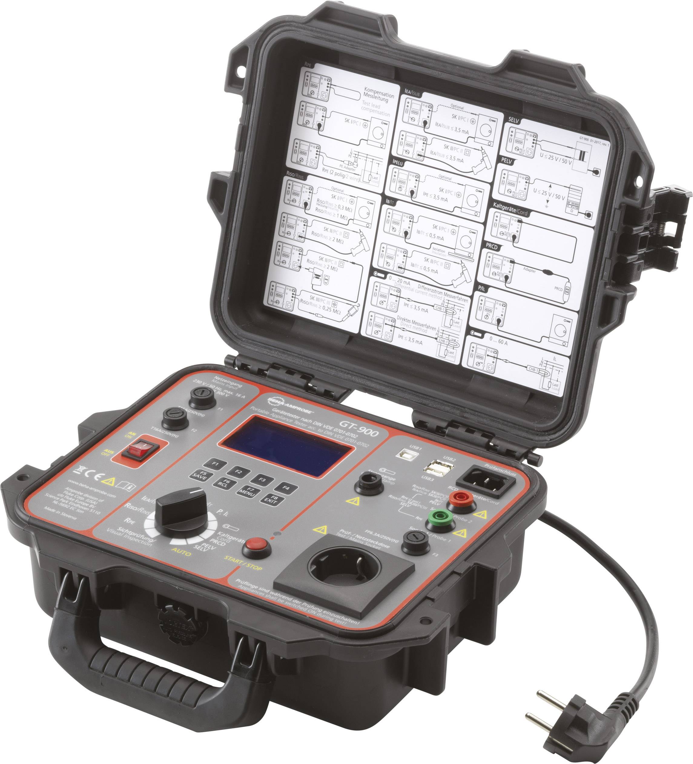 Un appareil de test électrique portable à couvercle ouvert montre des schémas de circuit à l'intérieur. Différentes connexions et un écran sont visibles.