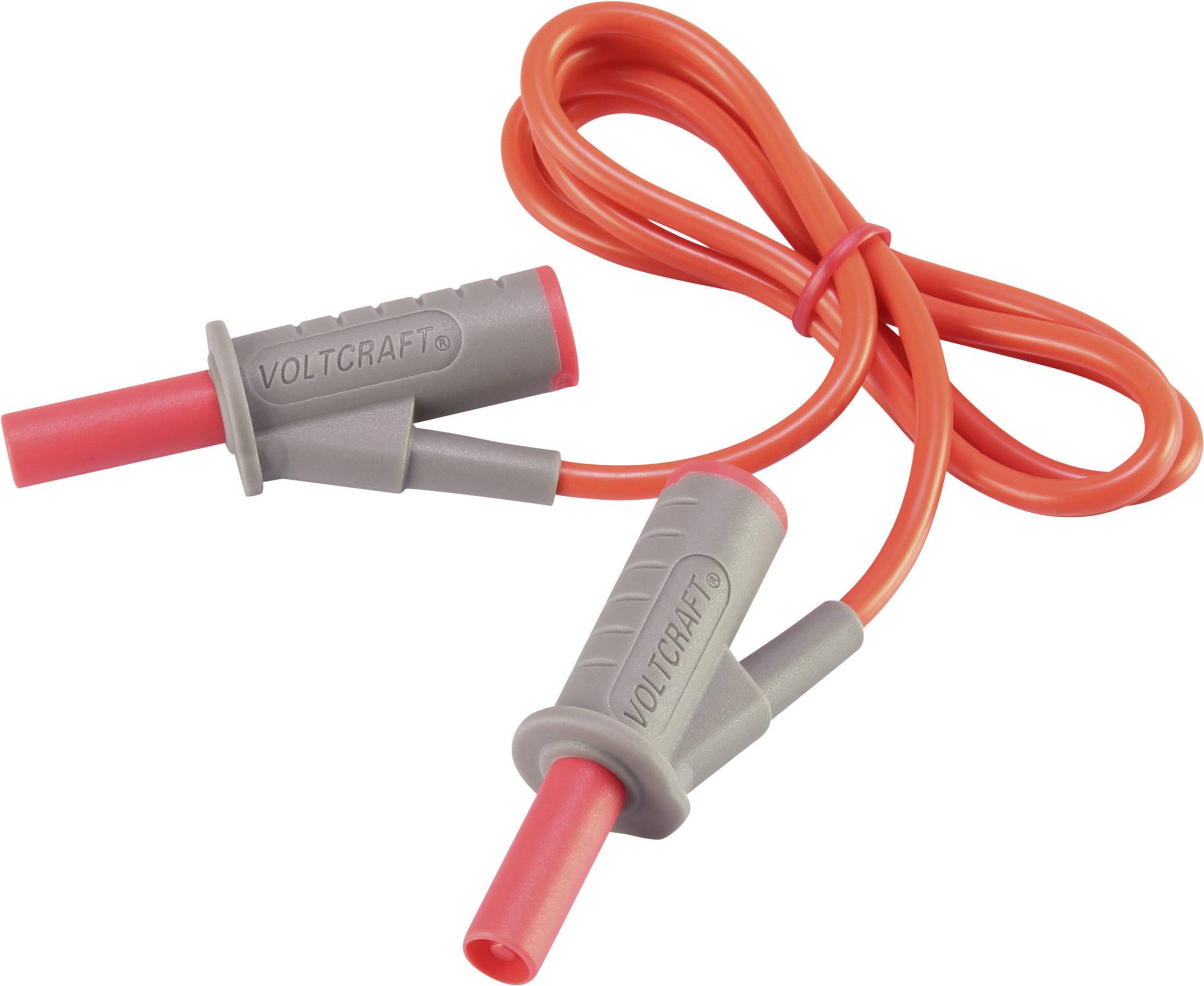 Pinces de câble grises Voltcraft avec des câbles rouges, utilisées pour les mesures électriques.
