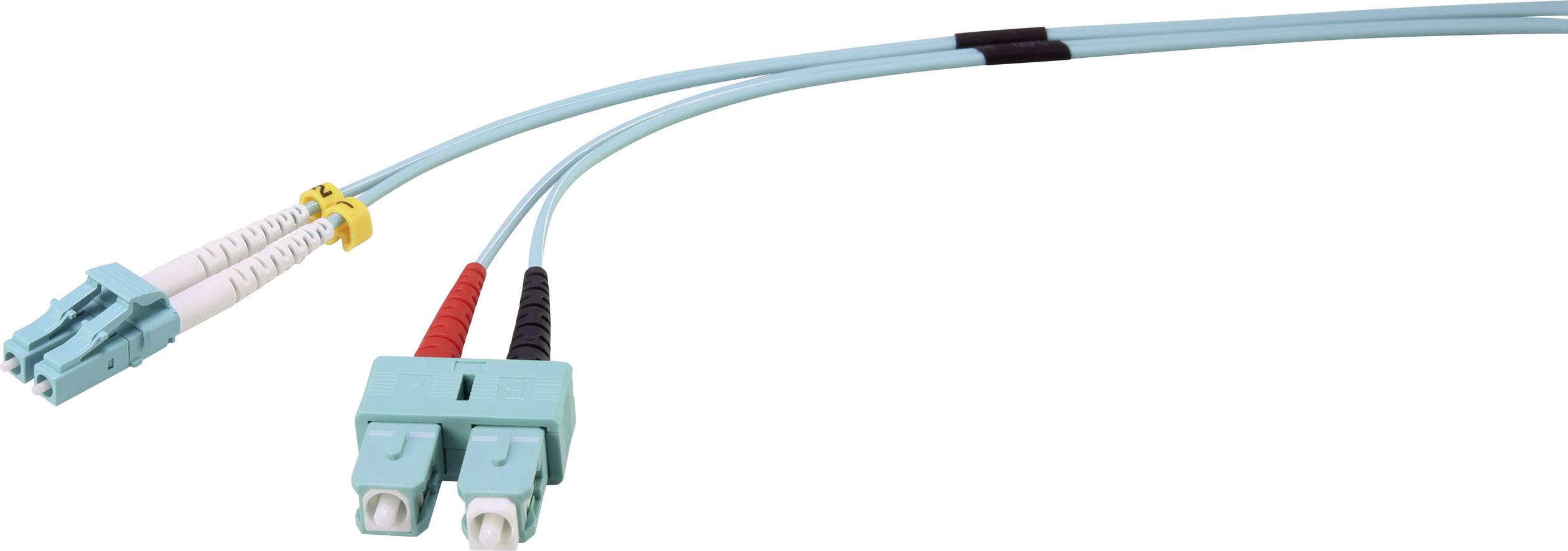 Deux câbles à fibre optique bleus munis de connecteurs LC et SC, utilisés pour des connexions internet à haut débit.