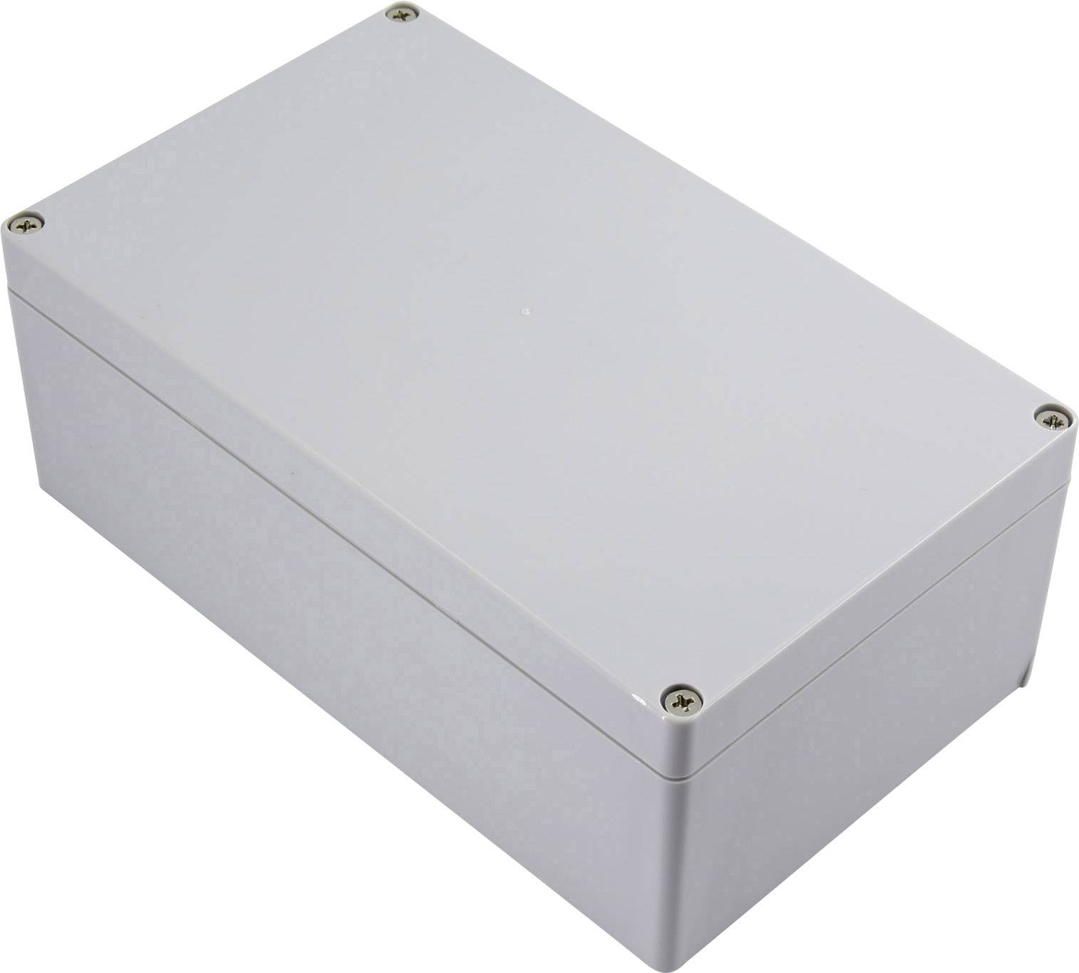 Un boîtier rectangulaire gris avec des vis aux coins. Il convient pour le rangement ou la protection de composants électroniques.
