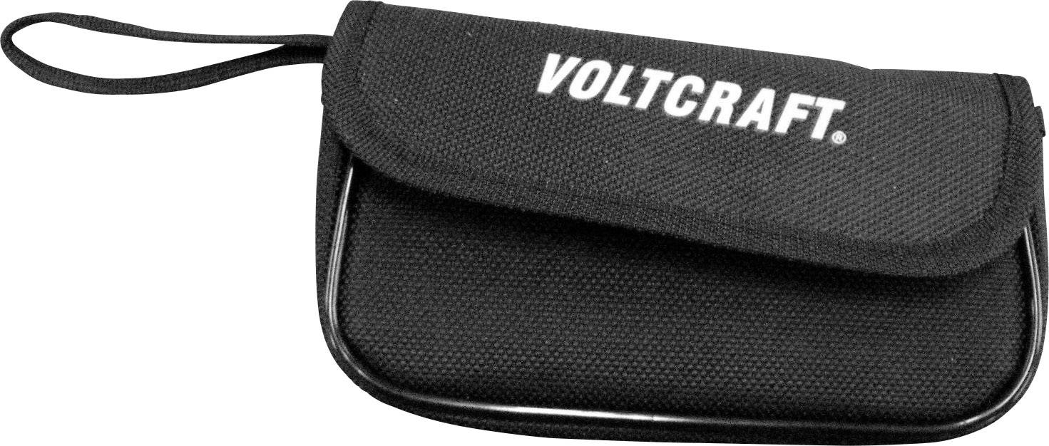 Un sac noir portant l'inscription 'VOLTCRAFT'. Il possède une bandoulière en haut à gauche et un rabat qui couvre l'ouverture.