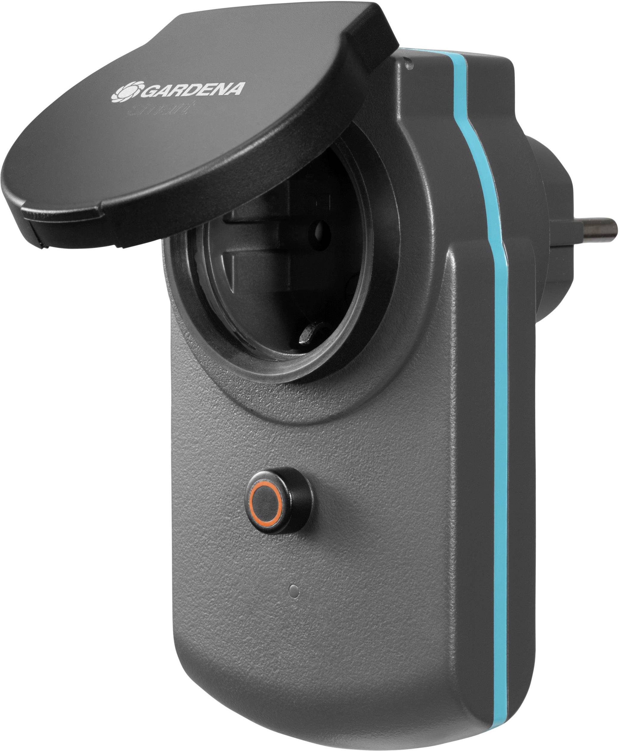 Une prise intelligente de Gardena utilisée pour le contrôle automatique des appareils de jardin. Elle est noire avec des accents bleus.