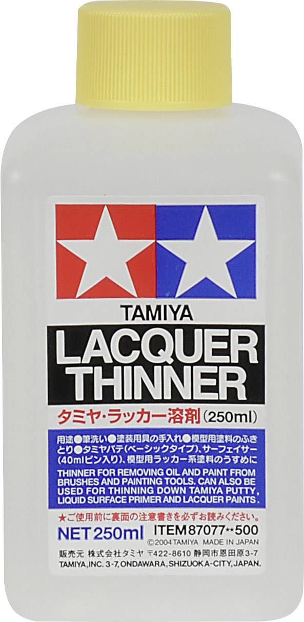 Bouteille en plastique avec étiquette 'Diluant Vernis Tamiya', 250ml, pour diluer les peintures laquées. Design en rouge, bleu et blanc.