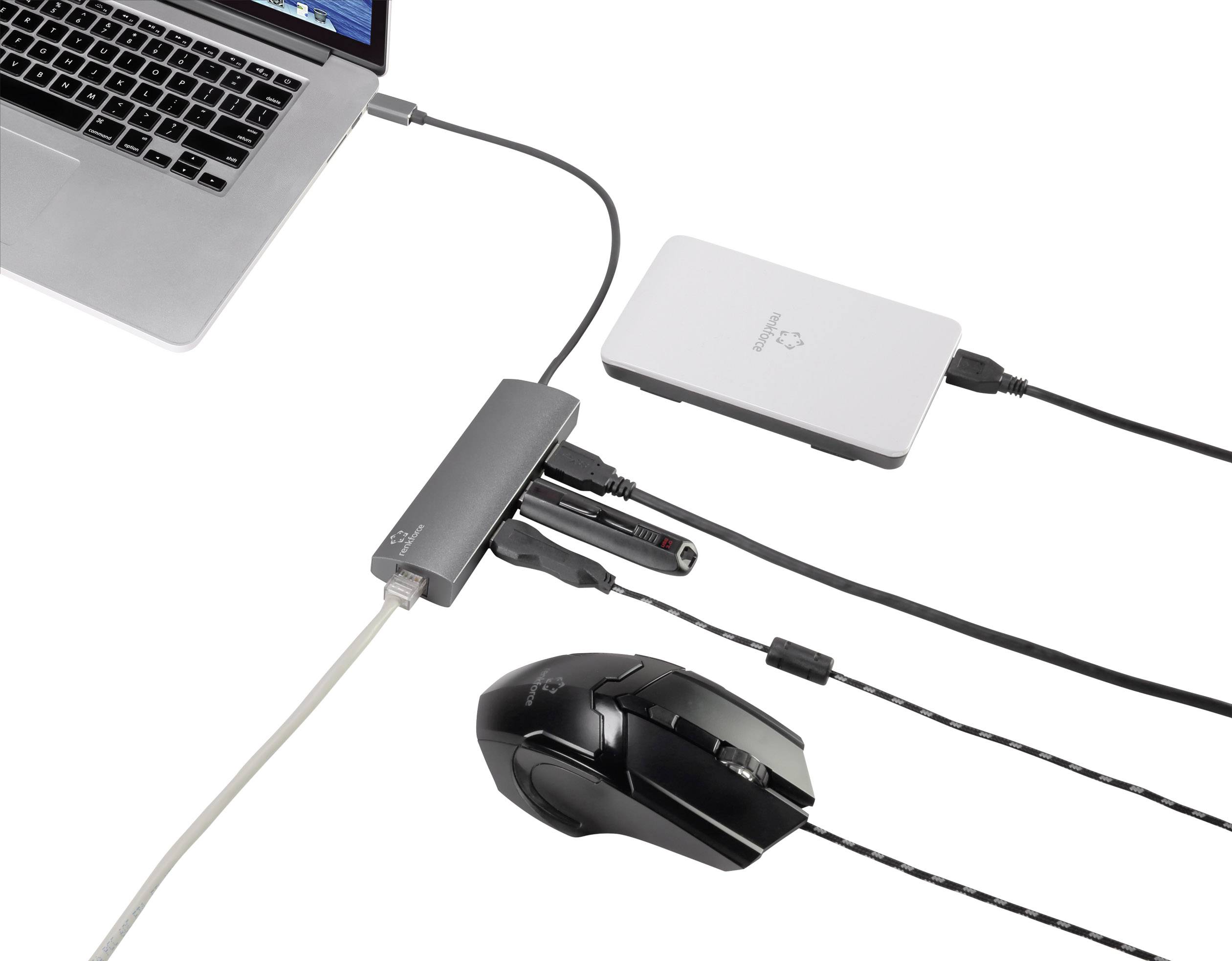 Ordinateur portable avec un hub USB, auquel sont connectés un disque dur externe, une souris et un autre périphérique USB.