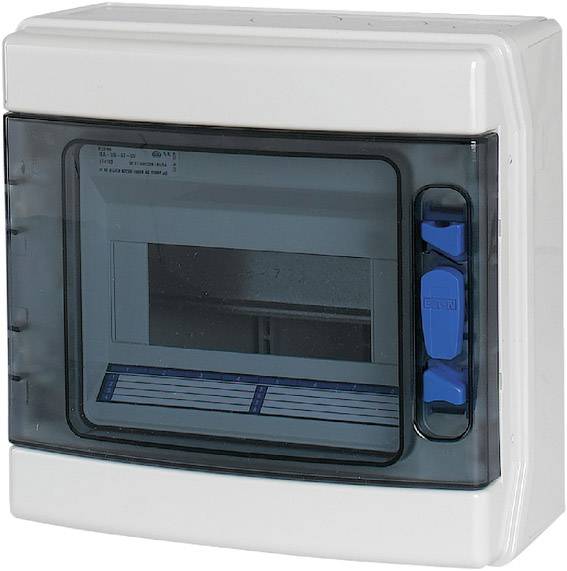 Un boîtier électrique blanc avec un couvercle transparent teinté de noir, montrant des interrupteurs de couleur bleue.