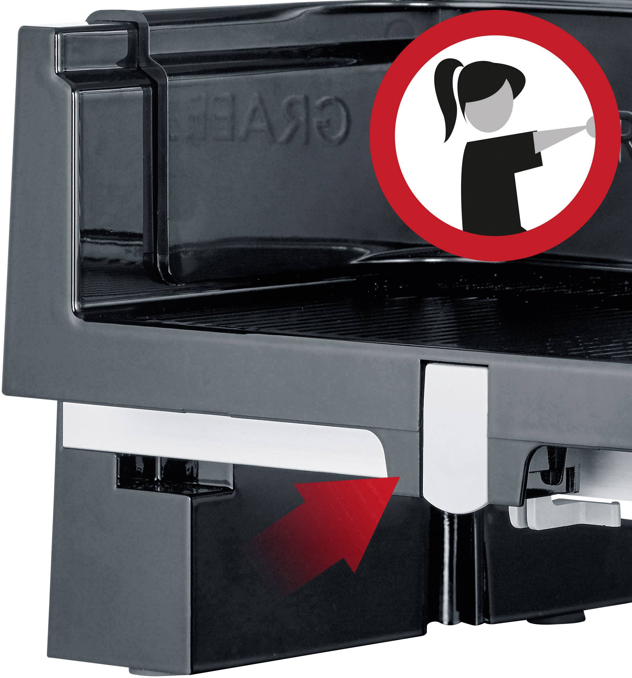 Partie d'une machine avec un symbole d'avertissement. Le symbole représente une personne stylisée avec la main levée. Une flèche signale la prudence.