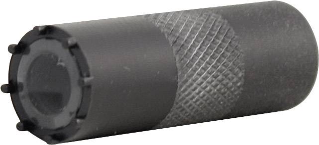 Un stylo métallique noir cylindrique avec un motif rainuré et une extrémité lisse repose sur une surface blanche.
