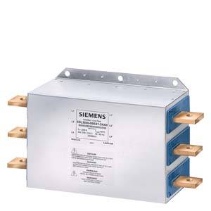 Un composant électronique rectangulaire avec une étiquette 'Siemens', probablement un condensateur électrique ou un filtre, muni de plusieurs pattes de connexion.