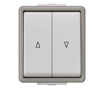 Interrupteur à bascule double dans un cadre rectangulaire, avec des symboles de flèches : vers le haut à gauche, vers le bas à droite.