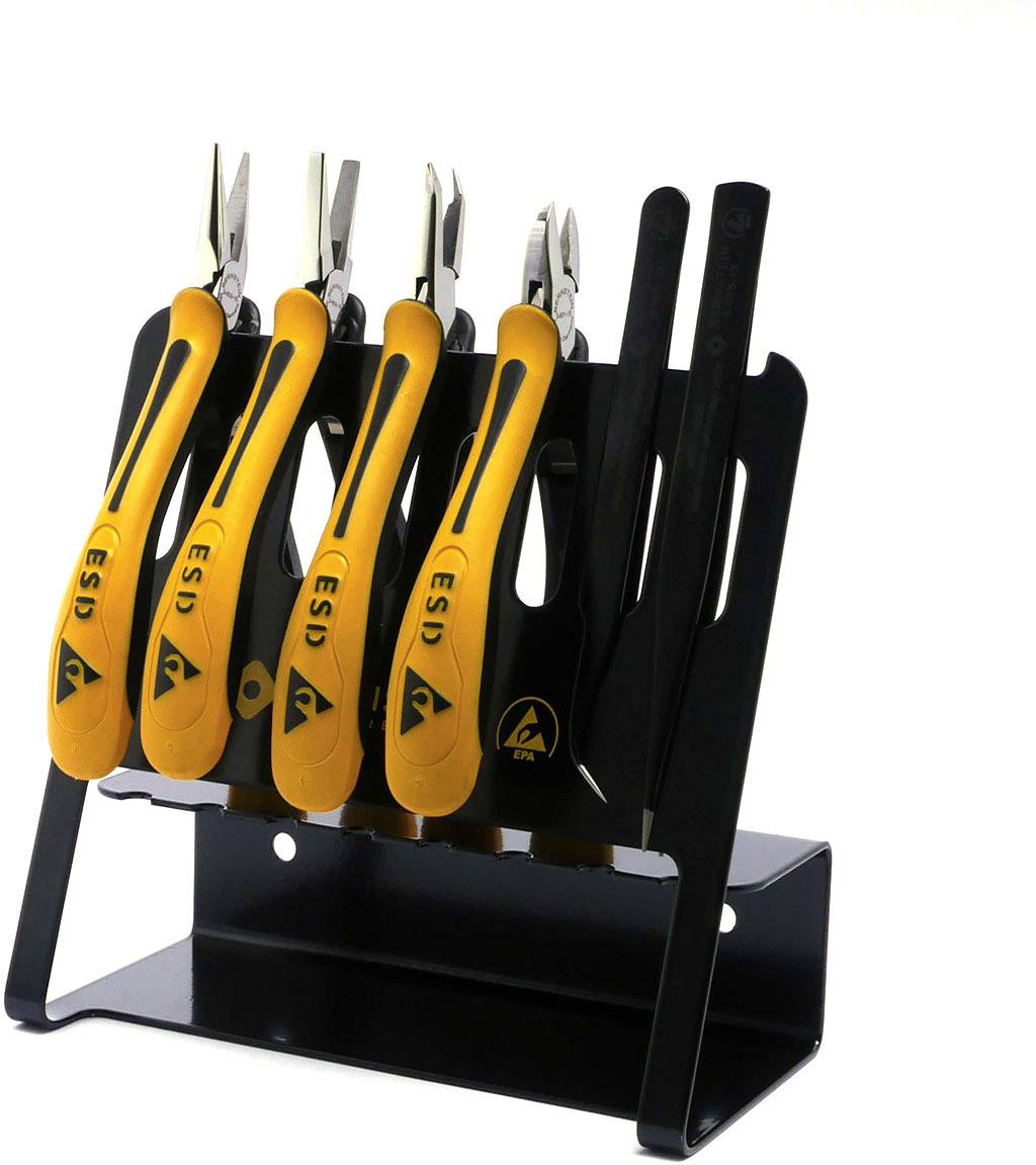 Un ensemble d'outils ESD, composé de pinces et de brucelles, avec des poignées jaune et noir, est placé dans un support à outils noir.