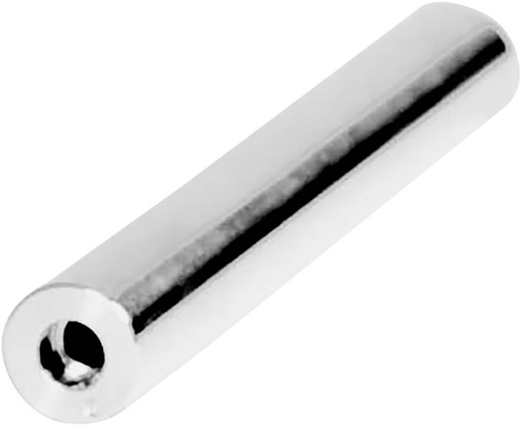 Une tige cylindrique en métal comportant un perçage central, probablement un composant d'un dispositif mécanique ou technique.