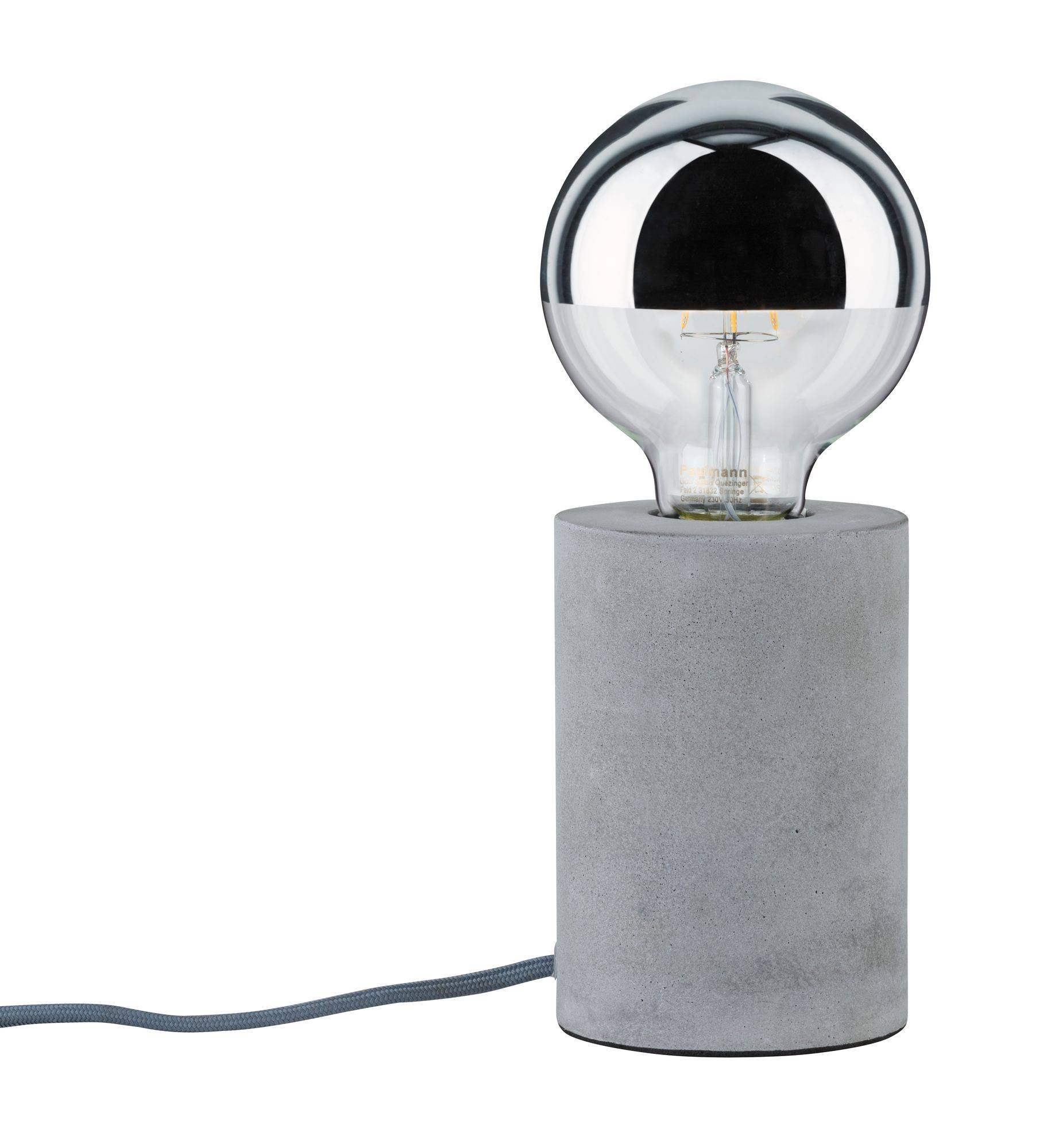Une ampoule est posée sur un socle cylindrique en béton. Un câble s'en échappe.