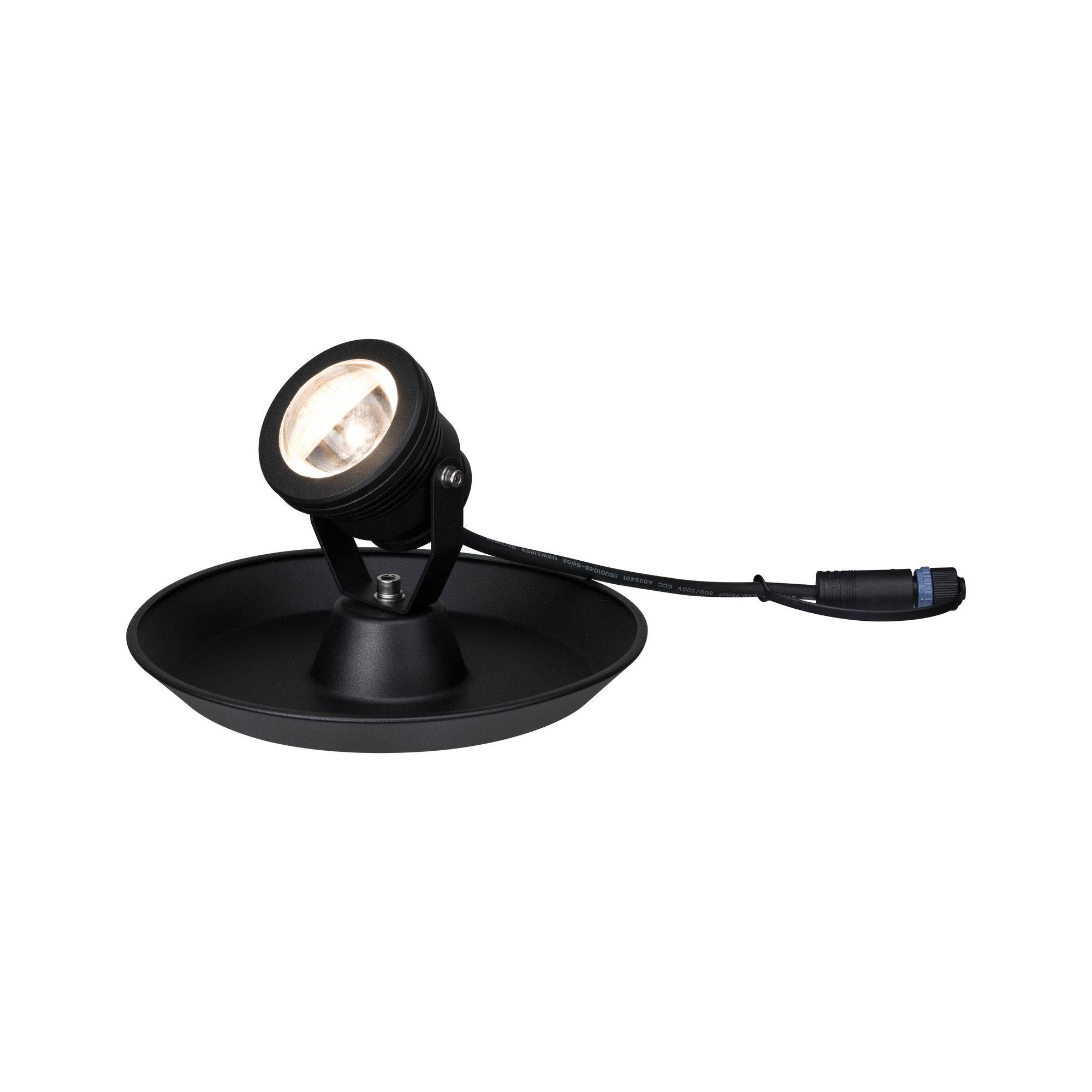 Projecteur noir, rond, sur socle avec câble ; adapté pour l'éclairage d'accentuation en extérieur.
