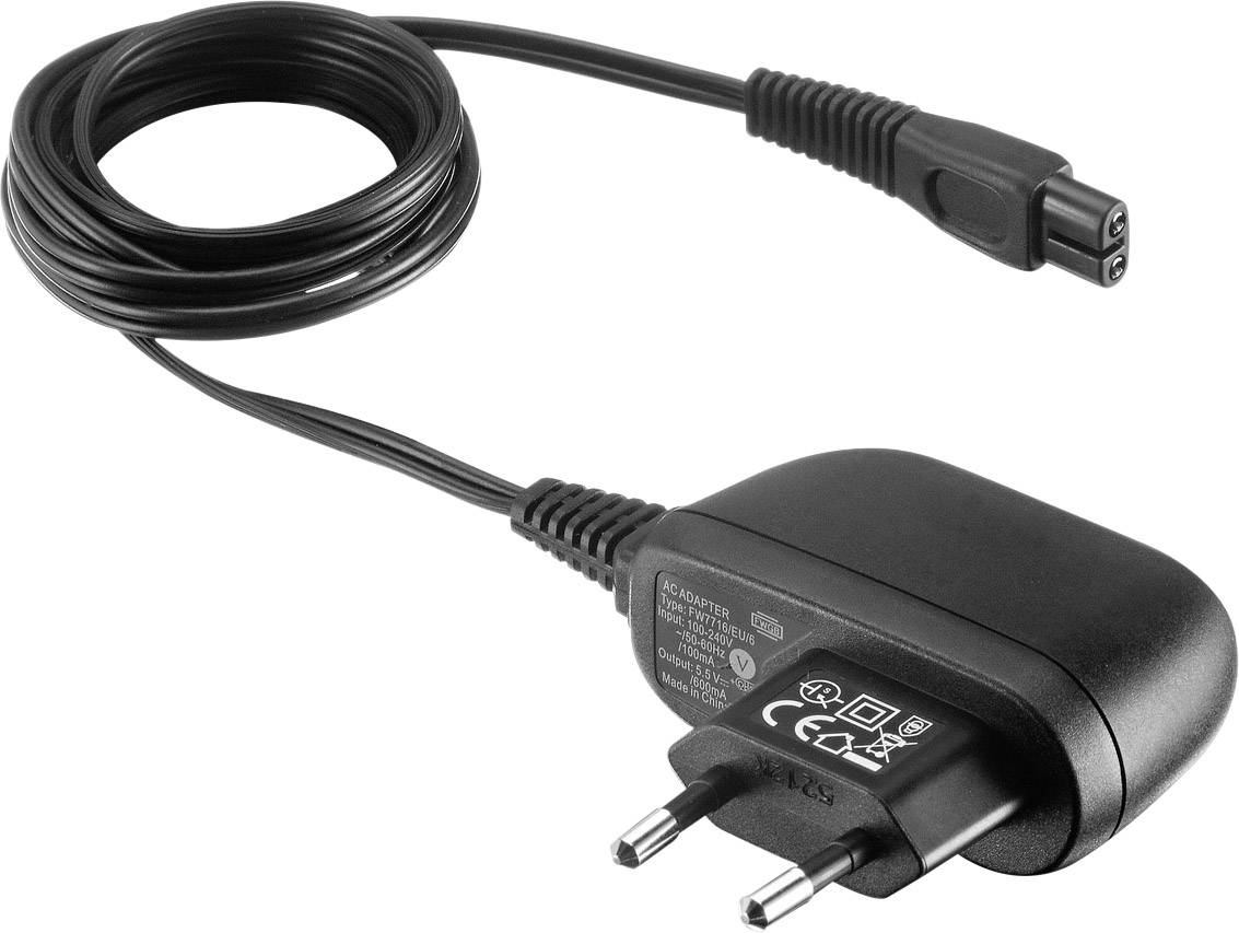 Adaptateur secteur noir avec connexion amovible. Fiche européenne et câble long. Marquage CE et détails techniques imprimés.
