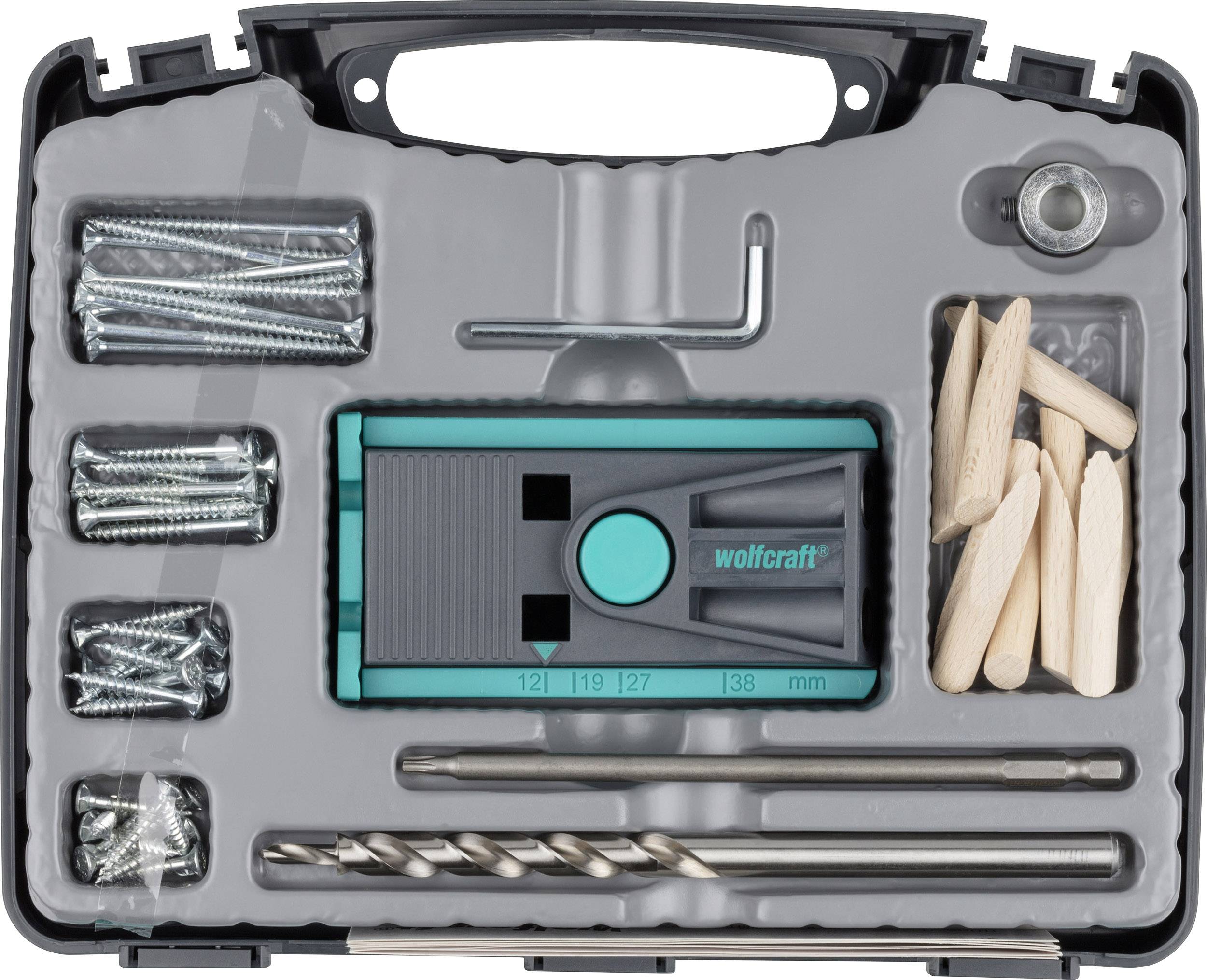 Une boîte à outils contenant des chevilles, des vis, des forets et un guide de perçage Wolfcraft. Idéal pour un perçage précis et des projets de bricolage.