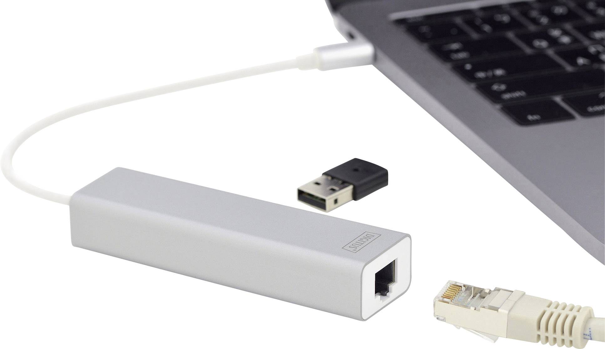 Un ordinateur portable est connecté à un câble réseau via un adaptateur USB-Ethernet. Un adaptateur USB Wi-Fi est posé à côté.