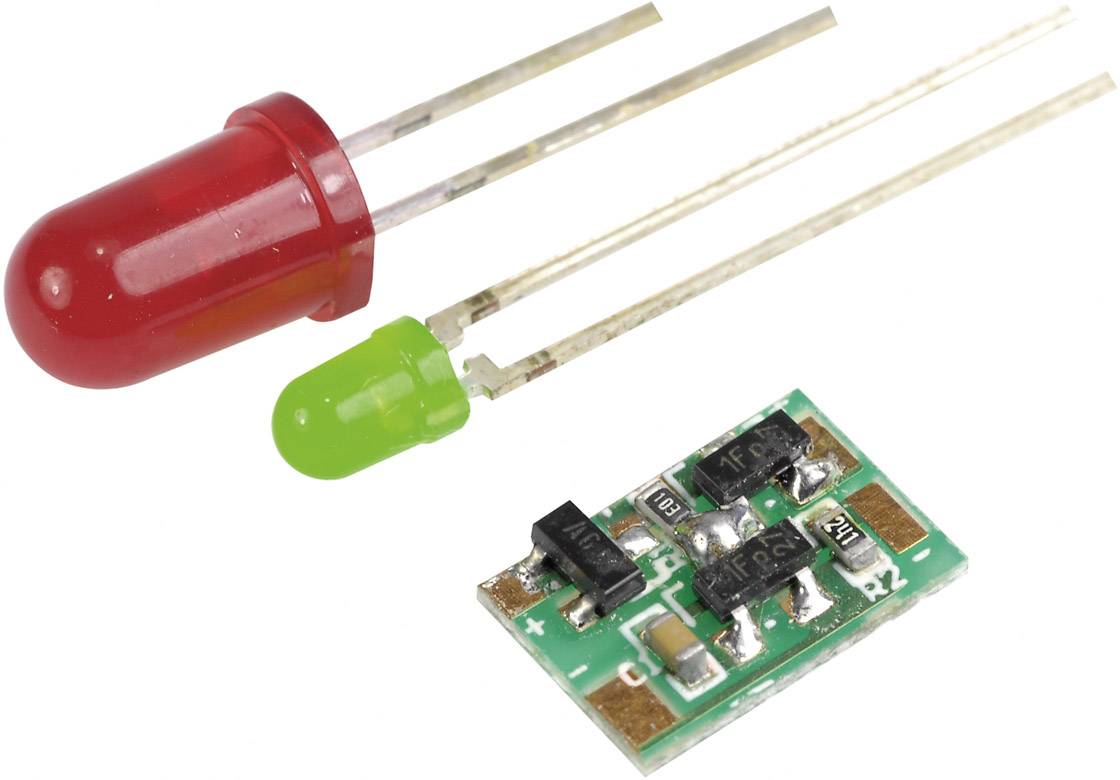 Une LED rouge, une LED verte et un circuit électronique avec plusieurs composants pouvant être utilisés pour l'alimentation électrique ou la commutation.