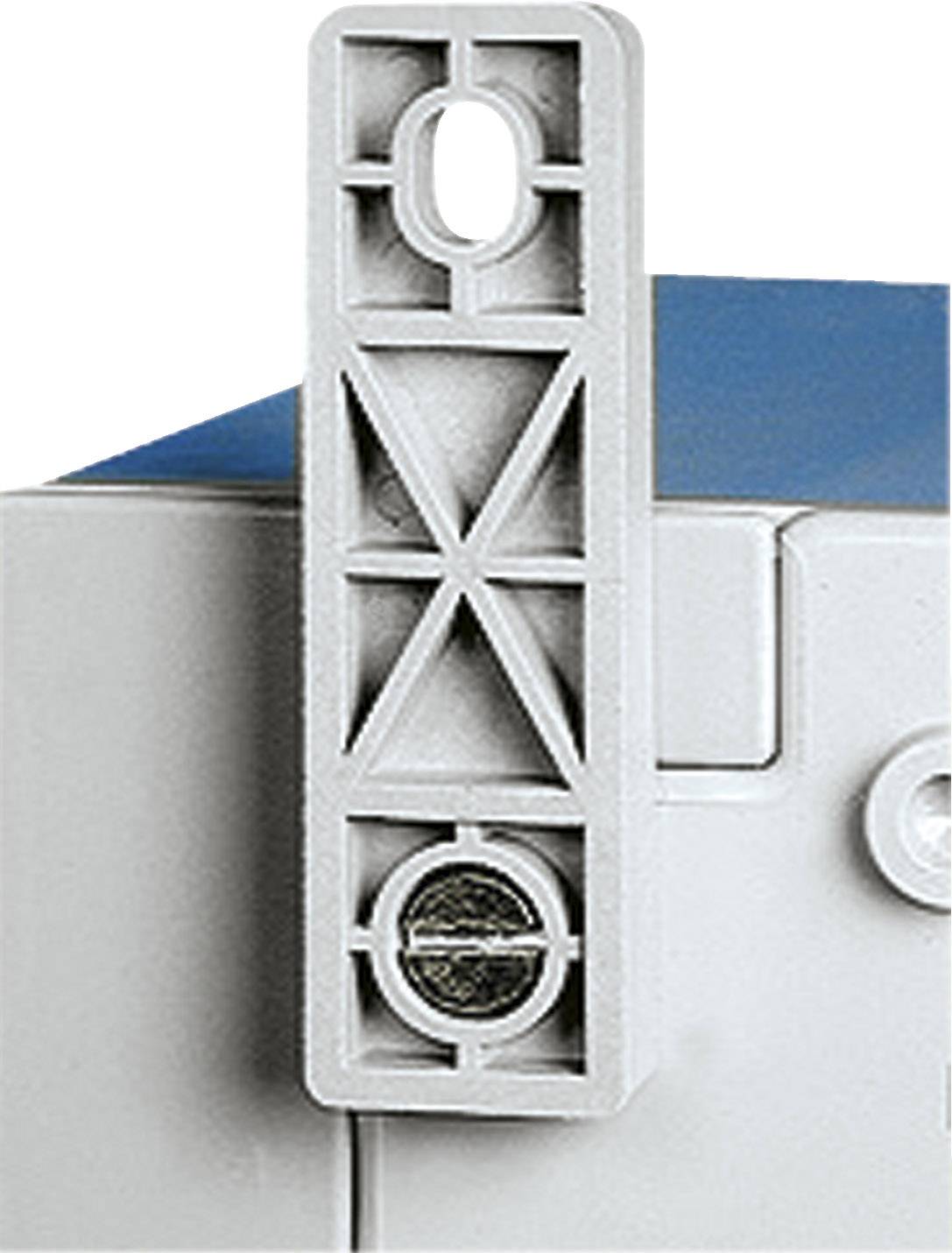 Pièce en plastique de forme rectangulaire avec des trous, fixée sur une surface bleue et blanche. Composant principal d'un dispositif plus grand.