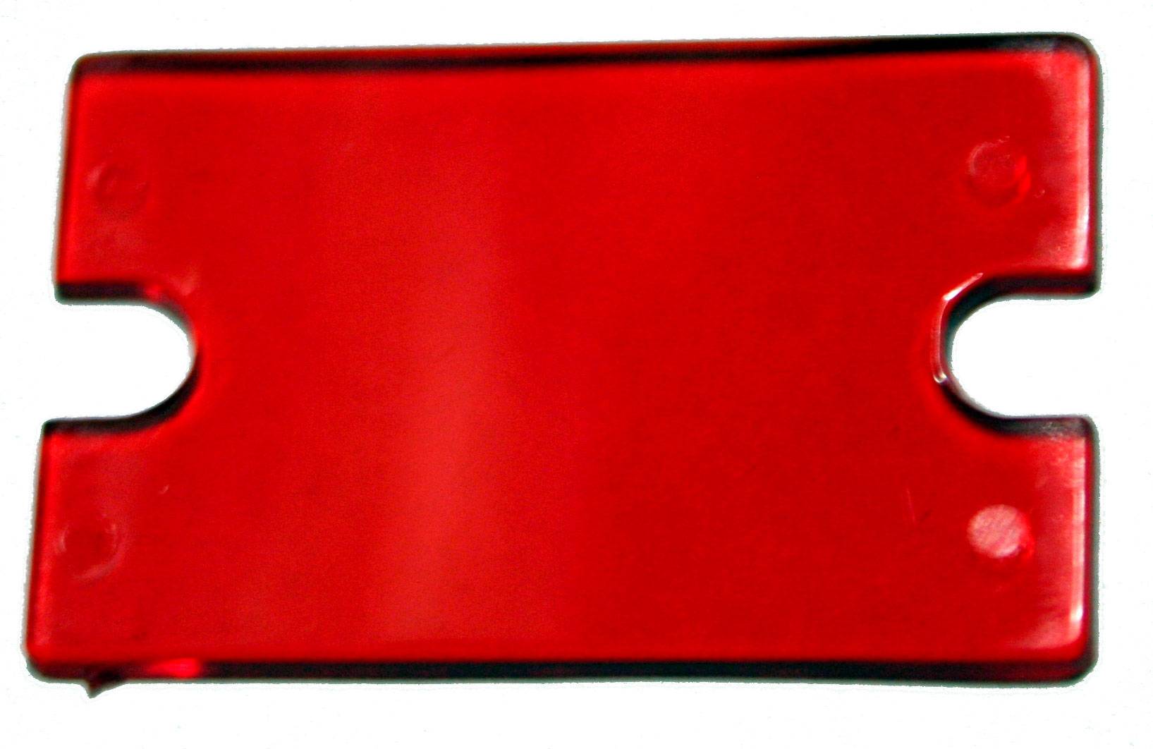 Un objet rectangulaire rouge aux coins arrondis avec une encoche sur un côté, sur un fond blanc.