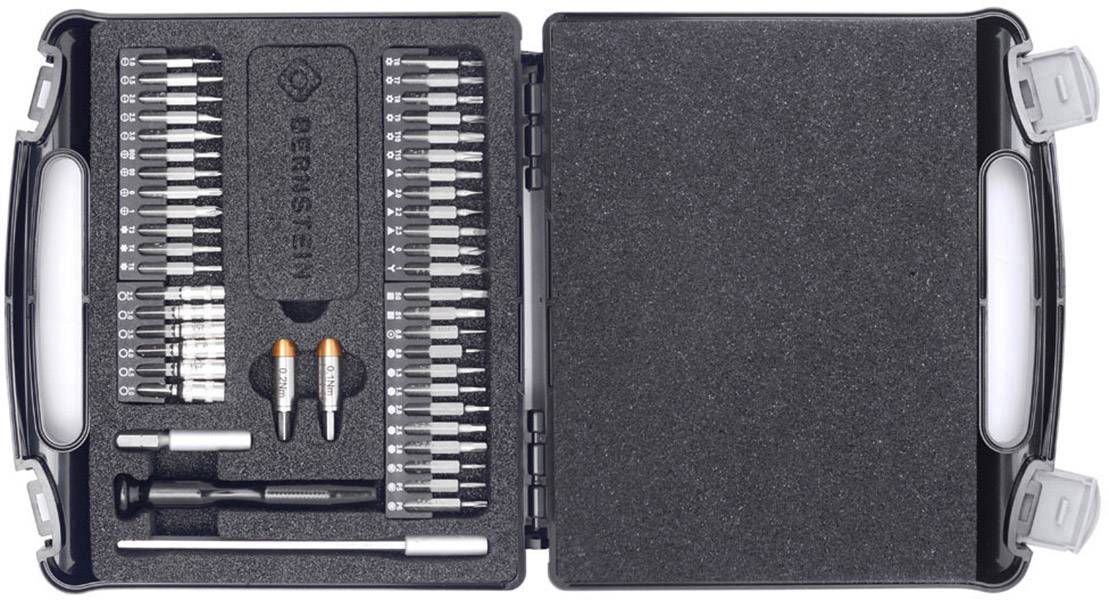 Mallette à outils comprenant des embouts de tournevis, un manche de tournevis et deux outils spéciaux, le tout soigneusement rangé.