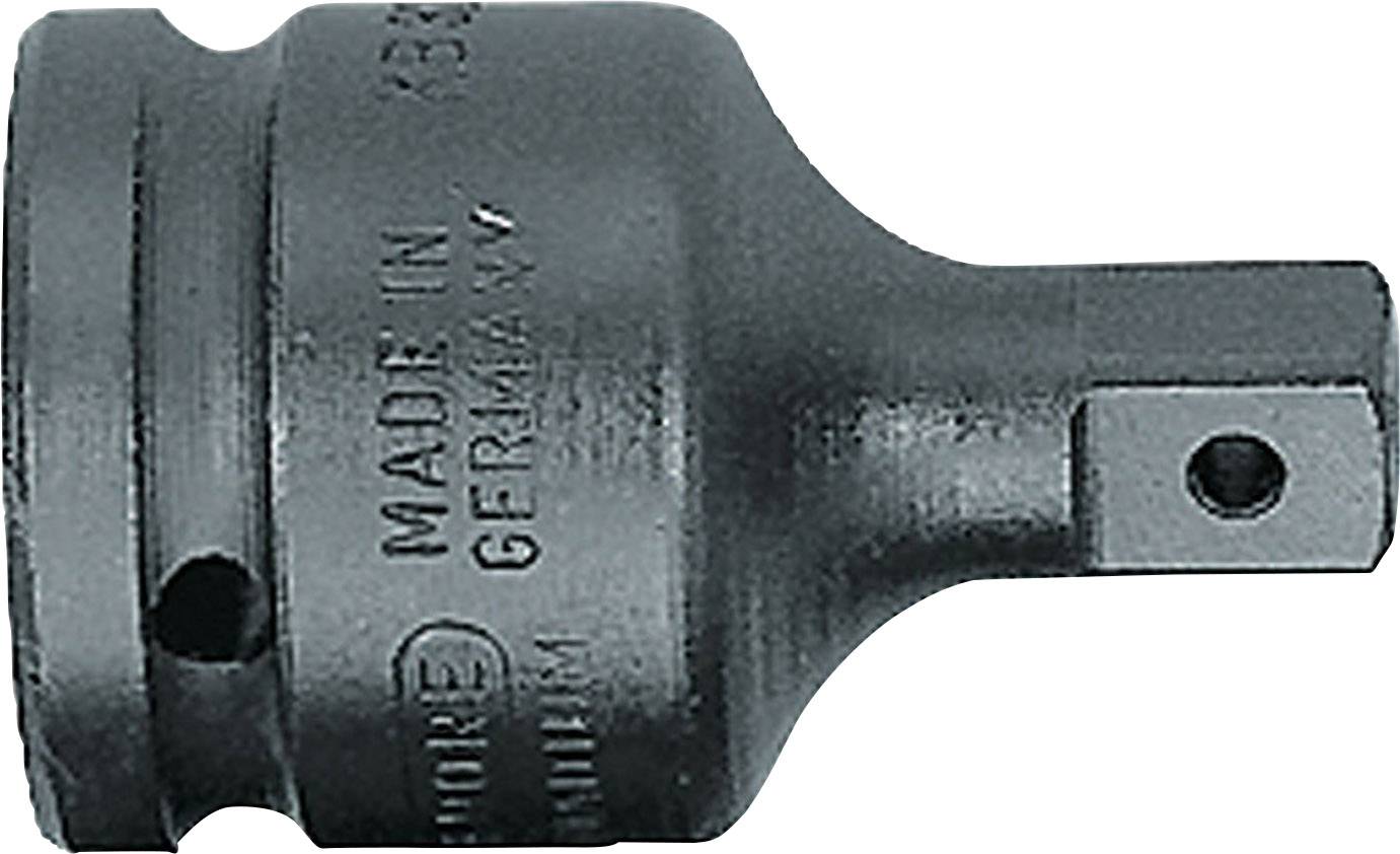 Adaptateur en métal, de forme cylindrique, avec un petit raccord carré et des gravures latérales : 'MADE IN GERMANY'.