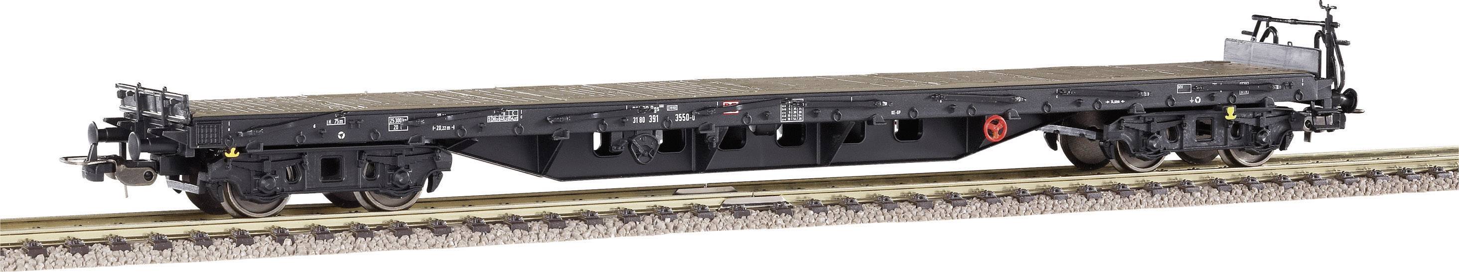 Un wagon plat sur rails, sans chargement, adapté au transport de marchandises volumineuses.